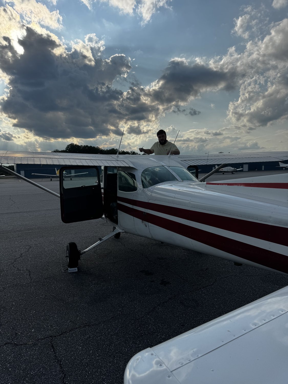 Randall pre-flighting the Cessna 172 on the ramp
